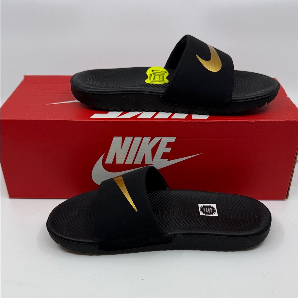 Nike Black Slides with Gold Swoosh